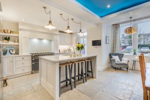 Picture of kitchen with large island in middle with seating