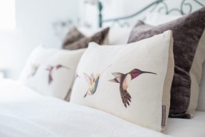 Image of bedroom two bed and cushions