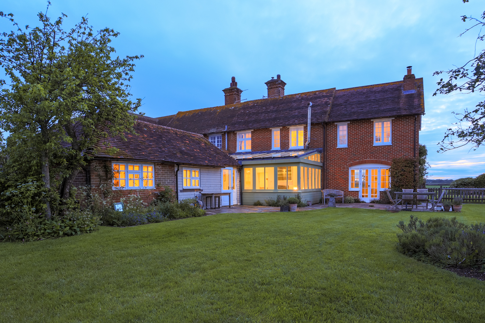 Twilight image of the cottage from the rear