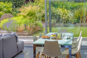 Image of the dining table with a view to the garden