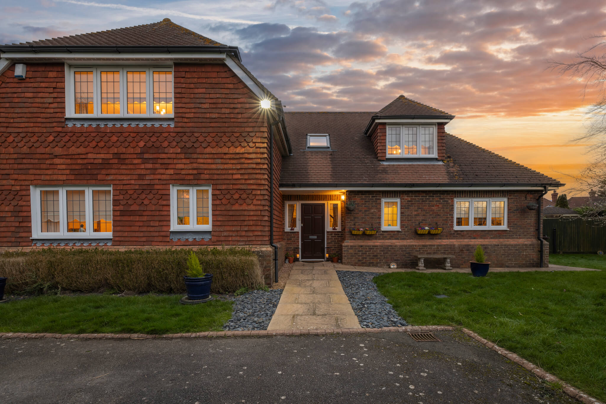 Twilight image of the front of the house